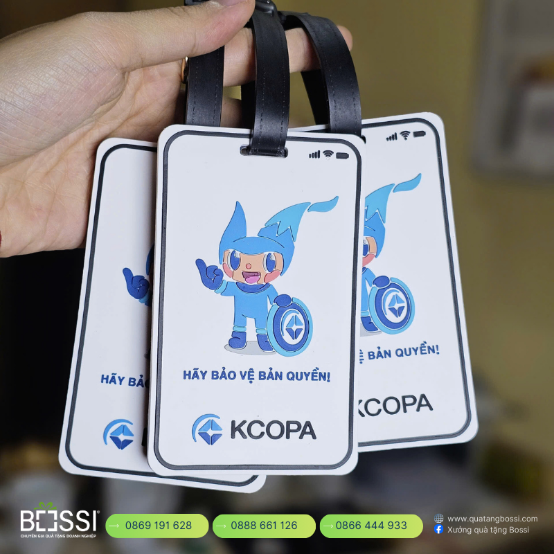 Đồng hồ quảng cáo in logo Bobby Unicharm Tag Treo Vali In Logo KCOPA